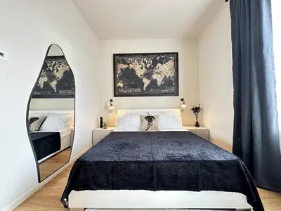 Letto o letti in una camera di Trilocale, 2 camere da letto, parcheggio gratuito