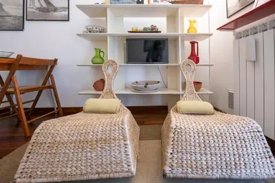 Letto o letti in una camera di 274b- Casa delle Due Baie, 10 minuti a piedi dalla Baia del Silenzio e dal Centro Storico