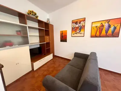 Area soggiorno di Casa del fiorista