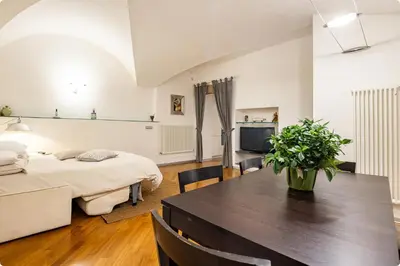 Letto o letti in una camera di Casa Garibaldi