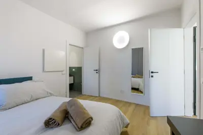 Letto o letti in una camera di il giardino di Alice