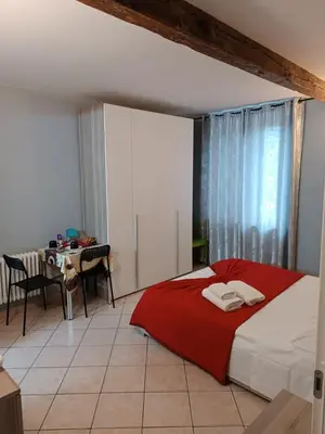 Letto o letti in una camera di CAMERA EMILIA via emilia ovest 224
