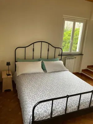 Letto o letti in una camera di Casa Margherita parking