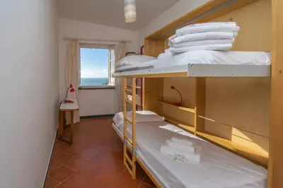 Letto o letti in una camera di Le terrazze sul mare