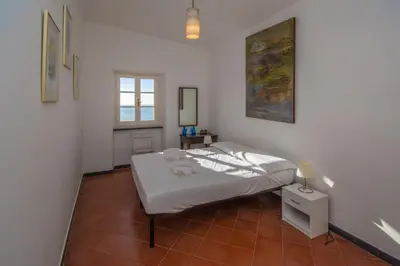 Letto o letti in una camera di Le terrazze sul mare