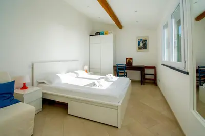 Letto o letti in una camera di Le terrazze sul mare