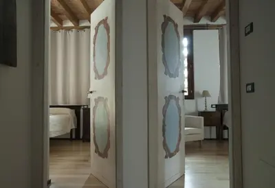 Letto o letti in una camera di Palazzo Turro Bed & Breakfast