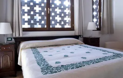 Letto o letti in una camera di Palazzo Turro Bed & Breakfast