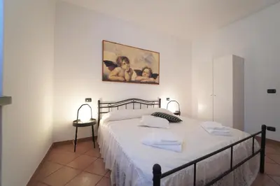 Letto o letti in una camera di Villa Adelaide 22 Pax by VILLASRETREATS