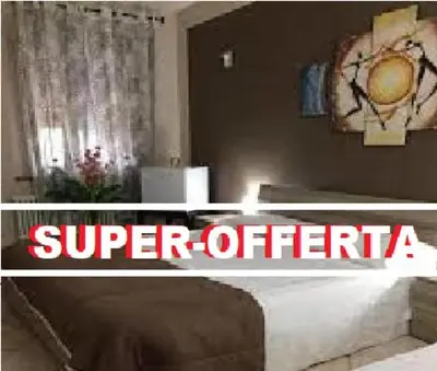 Letto o letti in una camera di Relax Time