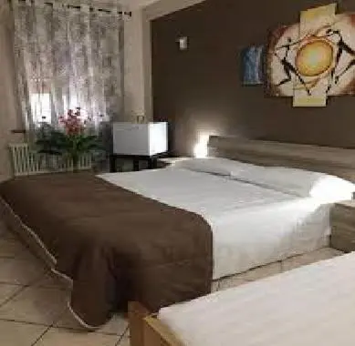Letto o letti in una camera di Relax Time