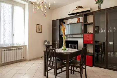 Cucina o angolo cottura di GuestHost - A Casa di Eufemia - Migliarina Station Apartment