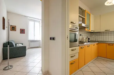 Cucina o angolo cottura di GuestHost - A Casa di Eufemia - Migliarina Station Apartment