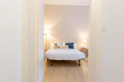 Letto o letti in una camera di Fleming Ospedale 300Mt Wifi Aria condizionata Free parking