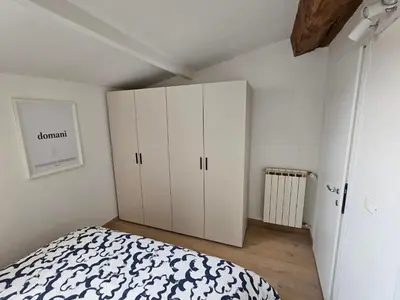 Letto o letti in una camera di Elegant and beautiful in the heart of Modena