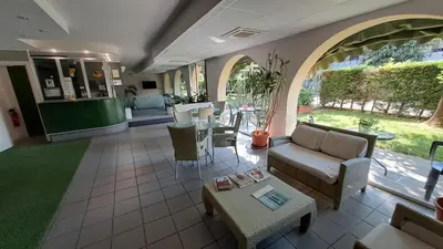 Area soggiorno di DUCATO HOTEL e RESIDENCE