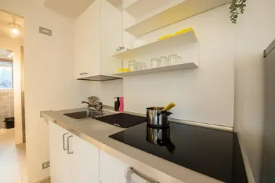 Cucina o angolo cottura di Loft Smart Parma l Wi-Fi Fibra, Indipendente, Perfetto per Business e Coppie