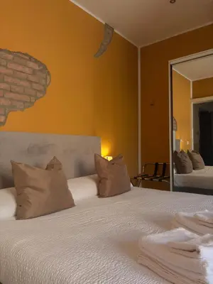 Letto o letti in una camera di Forum Guest House FREE Private Parking