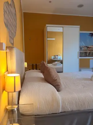 Letto o letti in una camera di Forum Guest House FREE Private Parking