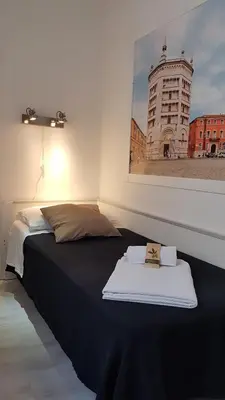 Letto o letti in una camera di Forum Guest House FREE Private Parking