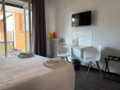 Letto o letti in una camera di Forum Guest House FREE Private Parking