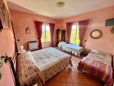 Letto o letti in una camera di La Casa Rosa
