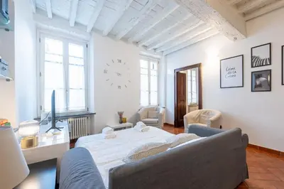 Area soggiorno di GuestHost - Piazza San Bartolomeo Bright&Comfy Apt x4