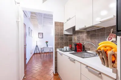 Cucina o angolo cottura di GuestHost - Piazza San Bartolomeo Bright&Comfy Apt x4