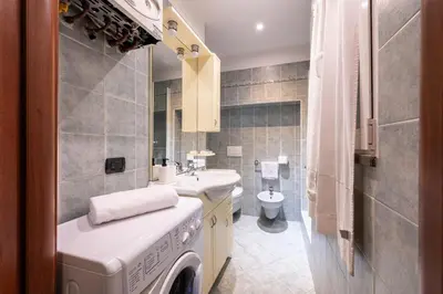 Bagno di GuestHost - Piazza San Bartolomeo Bright&Comfy Apt x4