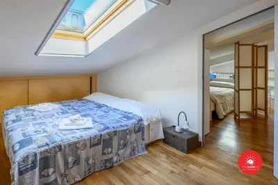 Letto o letti in una camera di Unique
