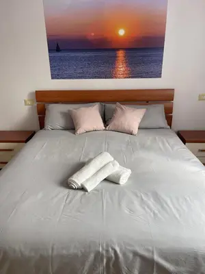 Letto o letti in una camera di HōM - Appartamento fino a 7 posti letto comodo al centro storico, al casello A1 e alla Stazione AV
