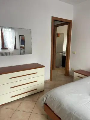 Letto o letti in una camera di HōM - Appartamento fino a 7 posti letto comodo al centro storico, al casello A1 e alla Stazione AV