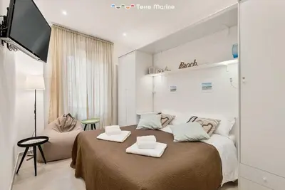 Letto o letti in una camera di L'Antica Piazzetta, Terre Marine
