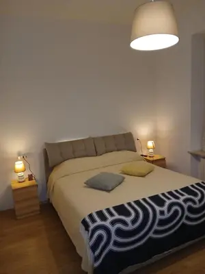 Letto o letti in una camera di inPARMA