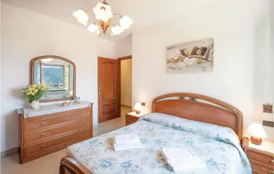 Letto o letti in una camera di Casa Rosmarino