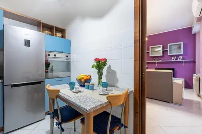 Cucina o angolo cottura di GuestHost - Parma Station Colorful Apartment with Balcony x5