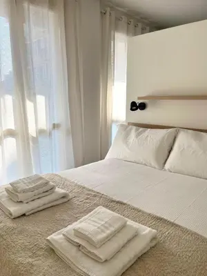 Letto o letti in una camera di I pini
