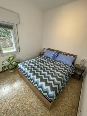 Letto o letti in una camera di Appartamento Calma