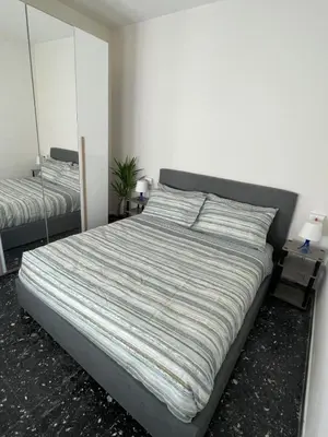 Letto o letti in una camera di Appartamento Calma