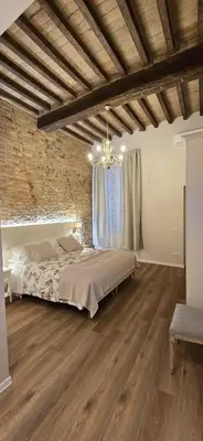 Letto o letti in una camera di Le camere di Rigoletto B&B