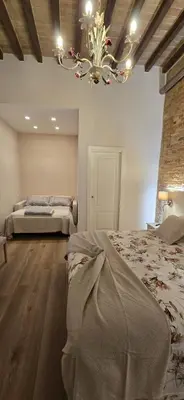 Letto o letti in una camera di Le camere di Rigoletto B&B