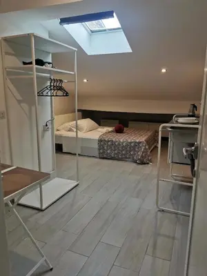 Letto o letti in una camera di Mansarda 2 SB