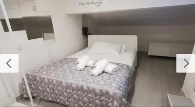 Letto o letti in una camera di Mansarda 2 SB