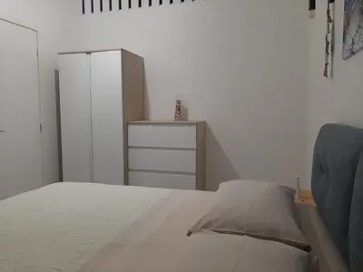 Letto o letti in una camera di Casa vacanze il sorriso di Eva