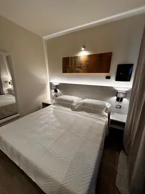 Letto o letti in una camera di Confidence Hotel Parma