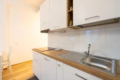 Cucina o angolo cottura di La Nonantolana Apartment - Eden e Ocean