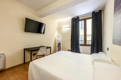 Letto o letti in una camera di Emilia Studios 1