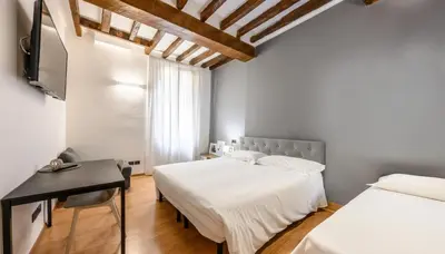 Letto o letti in una camera di Emilia Studios 3