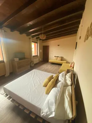 Letto o letti in una camera di Dal Maestro-Camere a Rivanazzano Terme