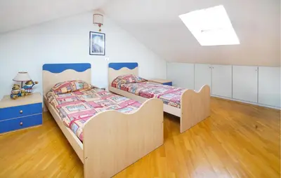 Letto o letti in una camera di 3 Bedroom Nice Home In Tavarone